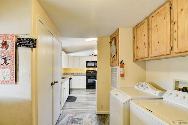 15980 County Road 306, Buena Vista, CO 81211 - clothes washing area with light wood finished floors and washer and clothes dryer
