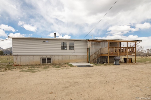 15980 County Road 306, Buena Vista, CO 81211 - rear view of house featuring a deck and stairs