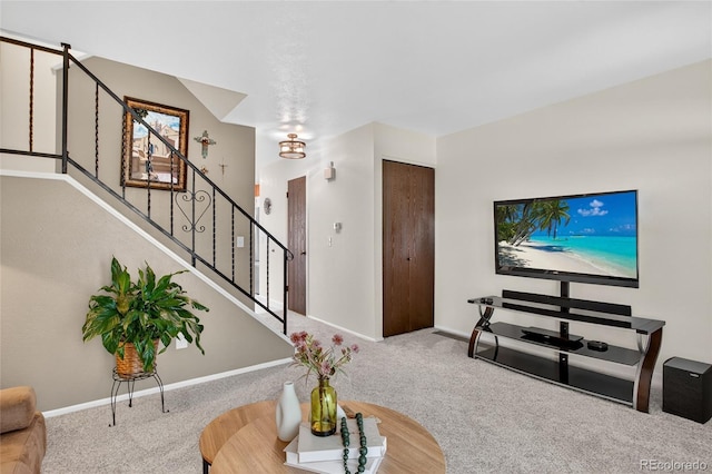 3947 W Ohio Ave, Denver, CO 80219 - carpeted living area with stairway and baseboards