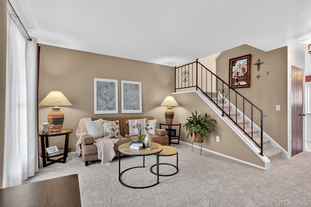 3947 W Ohio Ave, Denver, CO 80219 - carpeted living room with stairs and baseboards