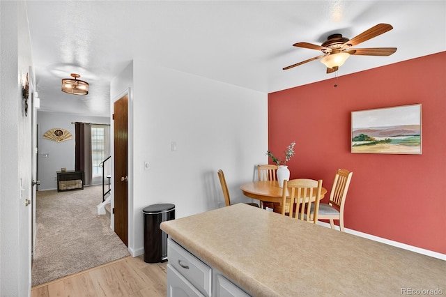 3947 W Ohio Ave, Denver, CO 80219 - dining area with ceiling fan and light wood finished floors