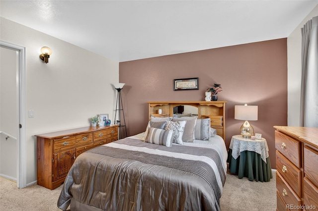 3947 W Ohio Ave, Denver, CO 80219 - bedroom featuring light carpet and baseboards