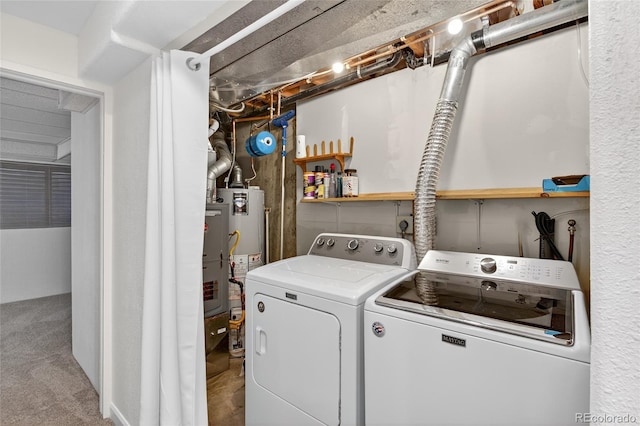 3947 W Ohio Ave, Denver, CO 80219 - laundry room with washing machine and clothes dryer, gas water heater, and carpet