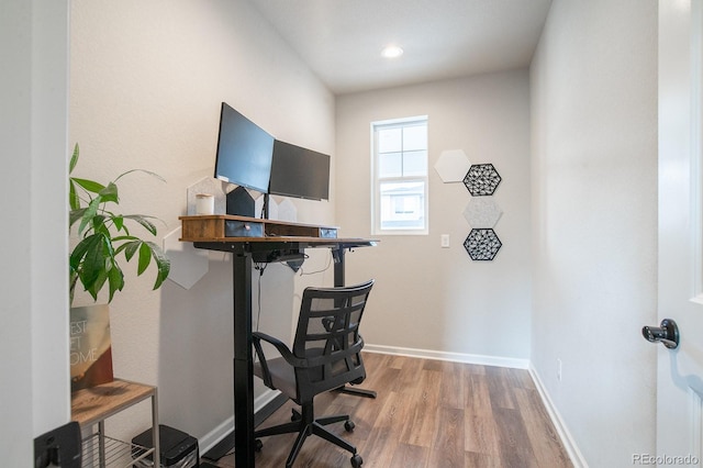 695 Simmental Loop, Castle Rock, CO 80104 - office area with wood finished floors and baseboards