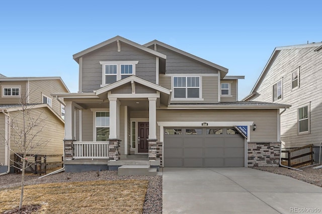 craftsman-style home featuring a porch and a garage