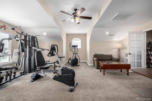 exercise area featuring a ceiling fan, carpet flooring, visible vents, and baseboards