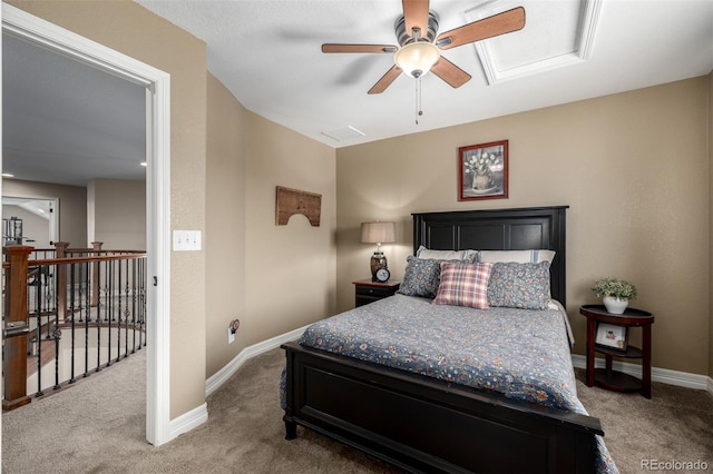 bedroom featuring carpet, visible vents, baseboards, and a ceiling fan