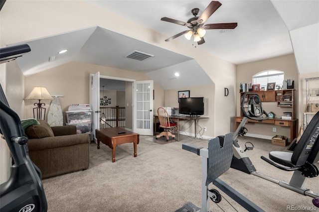 workout area featuring carpet floors, french doors, visible vents, vaulted ceiling, and baseboards