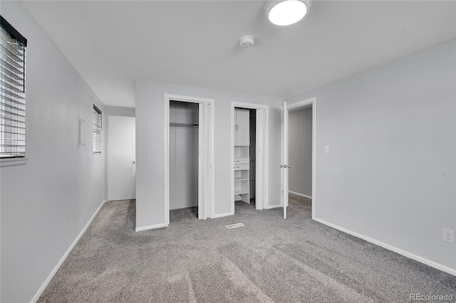 unfurnished bedroom featuring carpet flooring