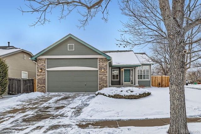 ranch-style home with a garage