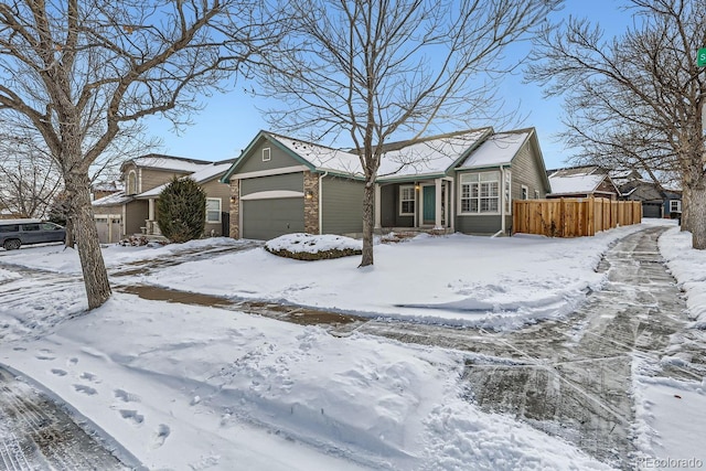 single story home with a garage