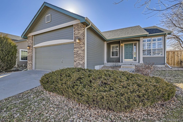 ranch-style house featuring a garage