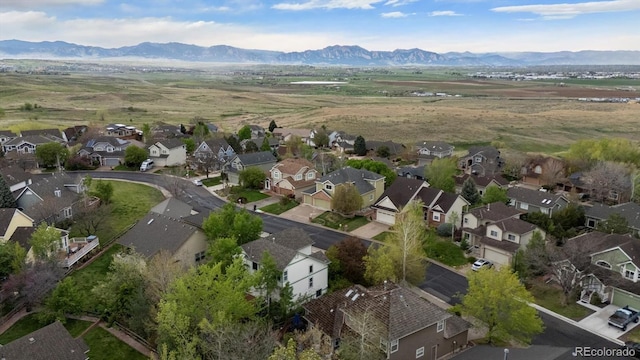 aerial view with a mountain view and a residential view