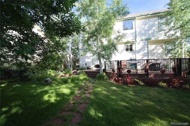 view of yard featuring a deck