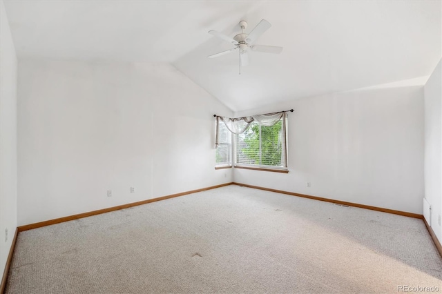 248 Summit Trl, Broomfield, CO 80020 - empty room with vaulted ceiling, baseboards, and carpet flooring