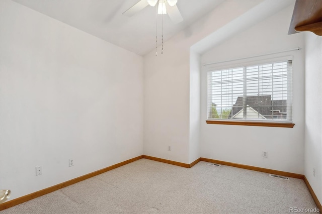 248 Summit Trl, Broomfield, CO 80020 - carpeted empty room with baseboards, ceiling fan, vaulted ceiling, and visible vents