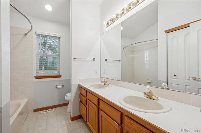 248 Summit Trl, Broomfield, CO 80020 - bathroom with a sink, baseboards, toilet, and visible vents