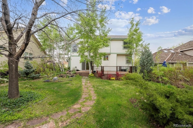248 Summit Trl, Broomfield, CO 80020 - back of house featuring a lawn and a deck
