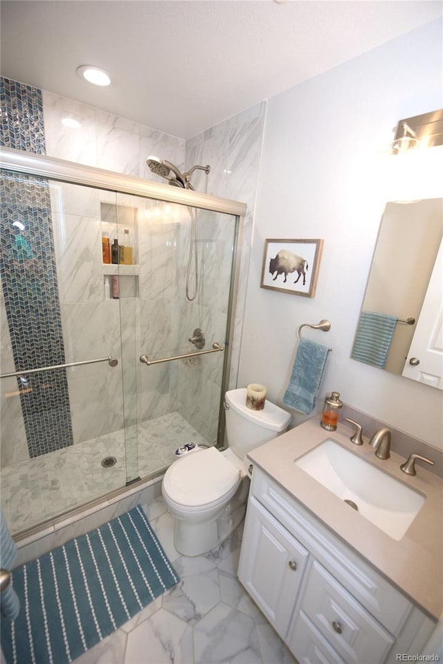 3111 W Bails Pl, Denver, CO 80219 - bathroom with marble finish flooring, vanity, a shower stall, and recessed lighting