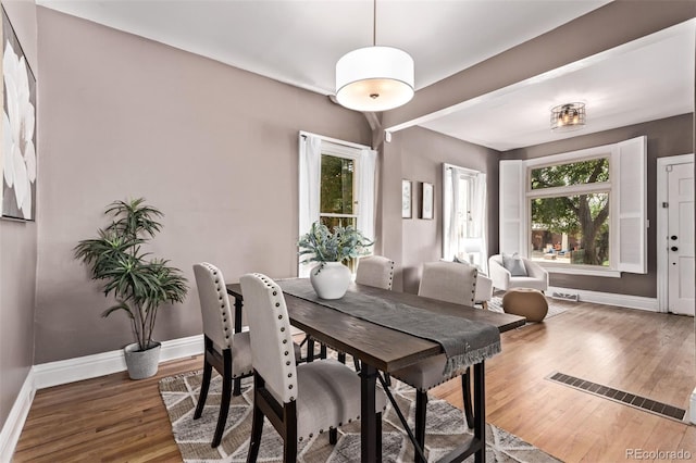 368 S Humboldt St, Denver, CO 80209 - dining area with baseboards and light wood-type flooring