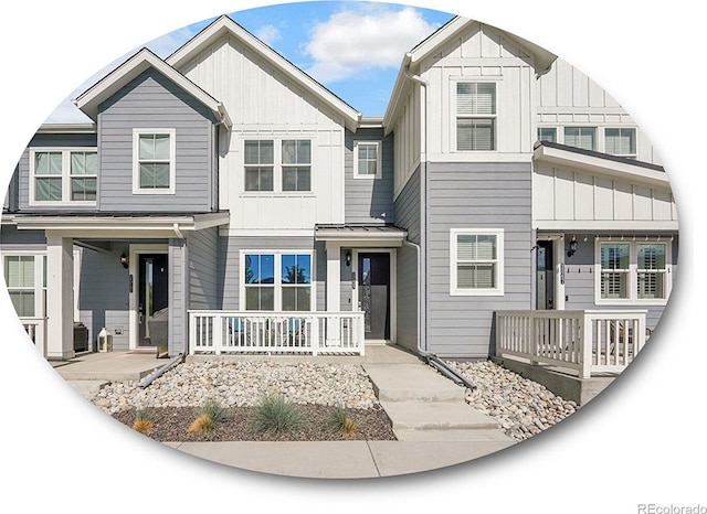 2059 S Vance Way, Denver, CO 80227 - view of front of house featuring board and batten siding and a porch