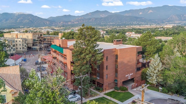 birds eye view of property with a mountain view