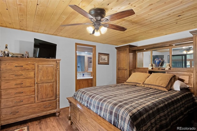 bedroom with connected bathroom, ceiling fan, wood ceiling, and light wood-type flooring