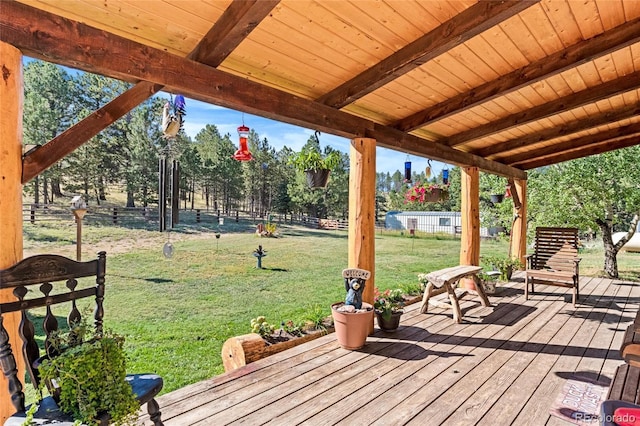 wooden deck with a yard