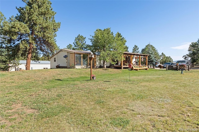 10000 State Highway 96, Westcliffe, CO 81252 - view of grassy yard with a deck