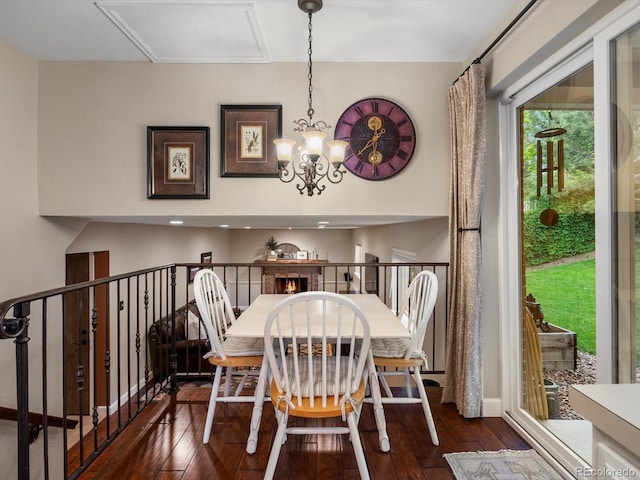 13762 W 67th Pl, Arvada, CO 80004 - dining area with wood-type flooring and a chandelier