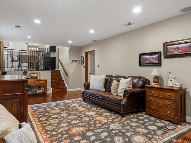 13762 W 67th Pl, Arvada, CO 80004 - living area featuring wood finished floors, stairway, recessed lighting, and a chandelier