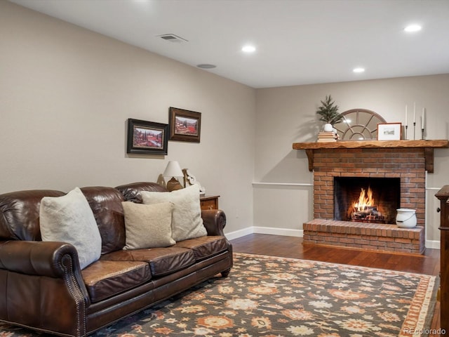 13762 W 67th Pl, Arvada, CO 80004 - living area featuring wood finished floors, recessed lighting, and a fireplace