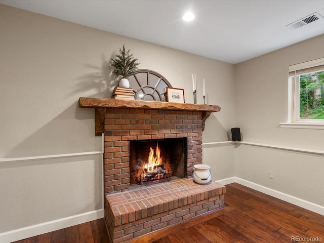 13762 W 67th Pl, Arvada, CO 80004 - detailed view of wood finished floors, a brick fireplace, and recessed lighting