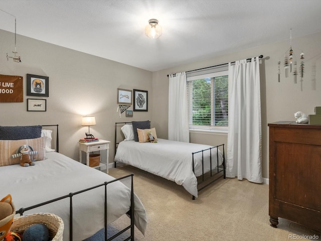13762 W 67th Pl, Arvada, CO 80004 - bedroom featuring light colored carpet and baseboards