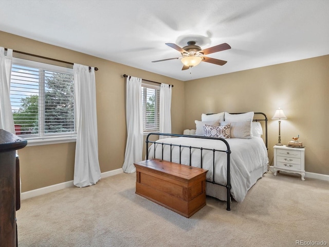 13762 W 67th Pl, Arvada, CO 80004 - carpeted bedroom with baseboards and a ceiling fan