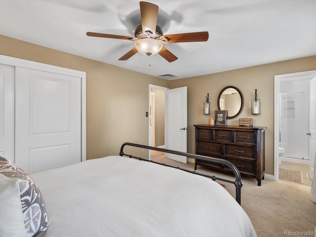 13762 W 67th Pl, Arvada, CO 80004 - bedroom featuring carpet flooring, a closet, ensuite bath, and a ceiling fan