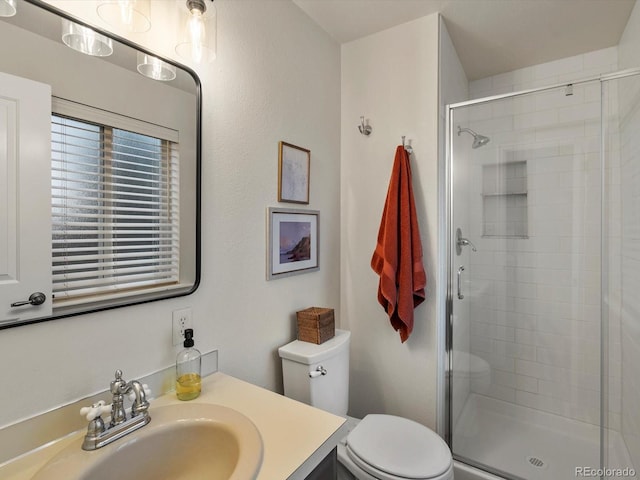 13762 W 67th Pl, Arvada, CO 80004 - bathroom featuring vanity and a stall shower