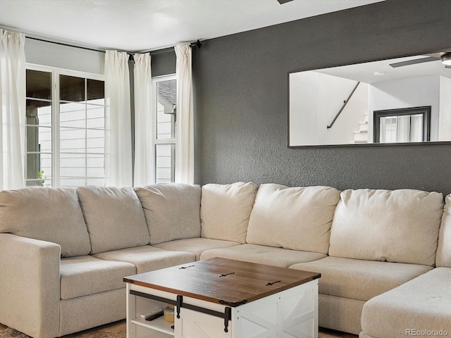 23222 E Orchard Pl, Aurora, CO 80015 - living room with a textured wall and a ceiling fan