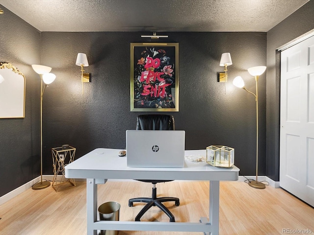 23222 E Orchard Pl, Aurora, CO 80015 - office area with a textured wall, wood finished floors, and a textured ceiling
