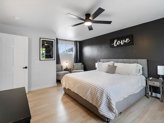 23222 E Orchard Pl, Aurora, CO 80015 - bedroom with wood finished floors and a ceiling fan