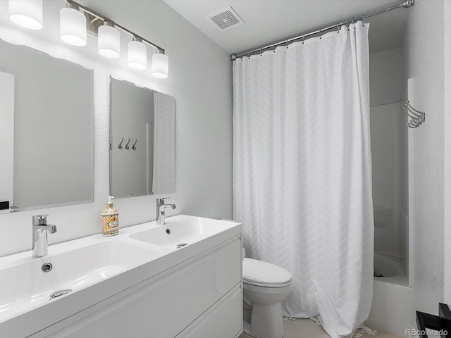 23222 E Orchard Pl, Aurora, CO 80015 - full bathroom featuring double vanity, shower / bath combo, and a textured wall