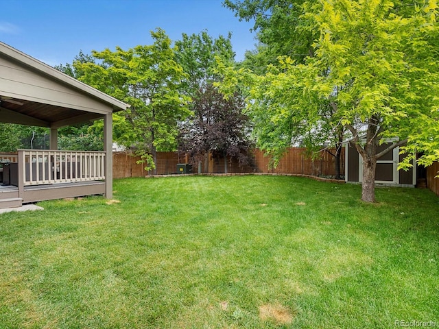 23222 E Orchard Pl, Aurora, CO 80015 - fenced backyard with a wooden deck