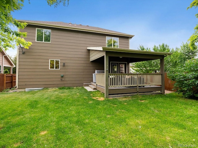 23222 E Orchard Pl, Aurora, CO 80015 - back of house featuring a wooden deck