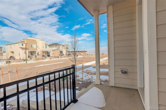 balcony featuring a residential view