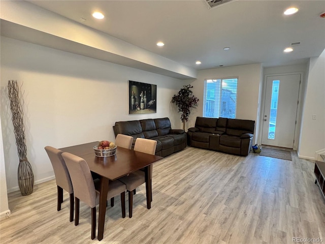 dining area featuring baseboards, recessed lighting, visible vents, and light wood-style floors