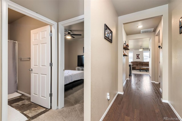 19468 E 65th Pl, Aurora, CO 80019 - corridor featuring wood finished floors and baseboards