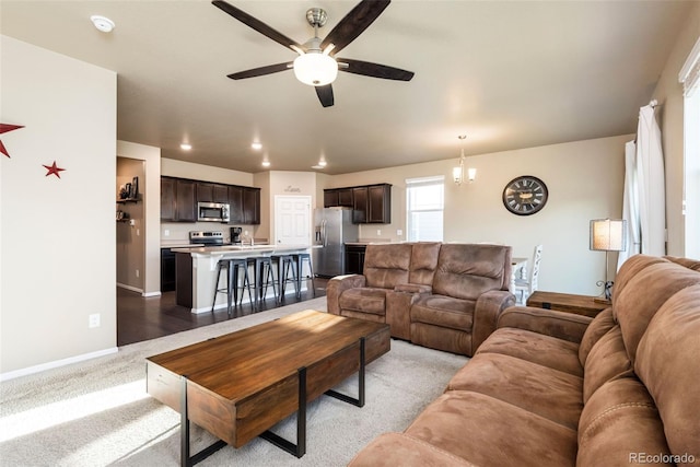 19468 E 65th Pl, Aurora, CO 80019 - living room featuring ceiling fan, baseboards, recessed lighting, and carpet floors