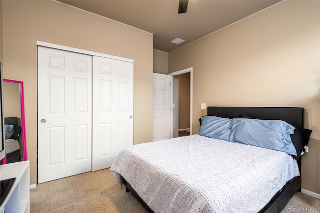 19468 E 65th Pl, Aurora, CO 80019 - bedroom featuring light colored carpet, a closet, a ceiling fan, and baseboards