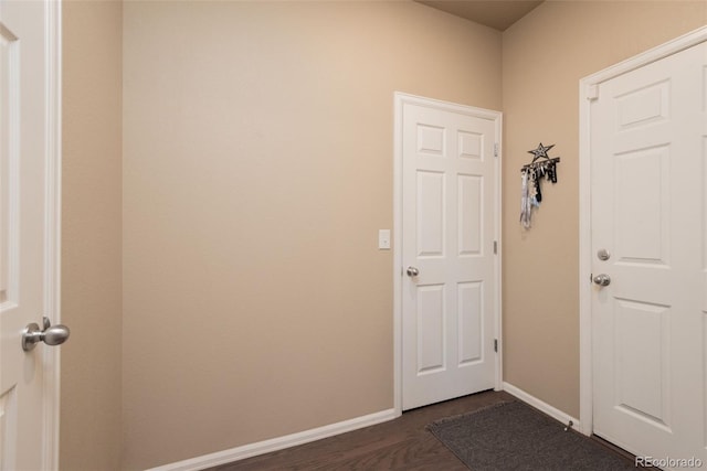 19468 E 65th Pl, Aurora, CO 80019 - doorway featuring baseboards and dark wood-type flooring