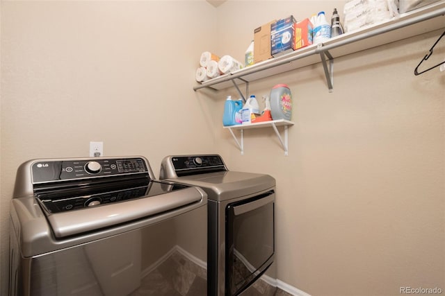 19468 E 65th Pl, Aurora, CO 80019 - laundry room with washing machine and clothes dryer and baseboards